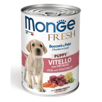 Dose Monge Fresh Hundefutter mit einem Labrador-Welpen, beschriftet mit "Puppy Vitello con Ortaggi" (Kalb mit Gemüse), mit Stücken in Laibform.